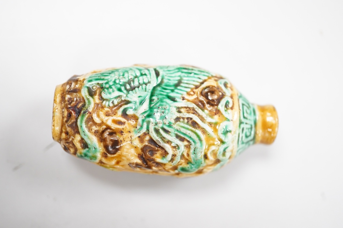 Three Chinese glass snuff bottles and a porcelain snuff bottle(4), tallest 8cm high